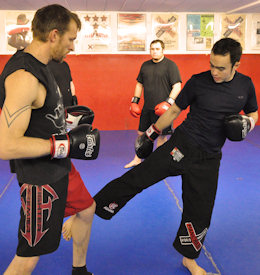 Prof. Billy Hendricks teaches kickboxing techniques