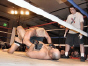 Billy Hendricks referees an MMA title bout