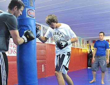 Professor Hendricks observes heavybag drills
