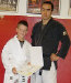 Professor Hendricks gives yellow belt promotion